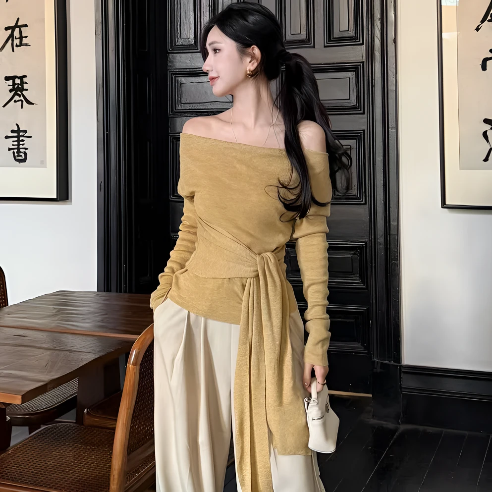 法式气质绑带收腰斜肩早秋针织上衣女长袖+黑色半身裙套装