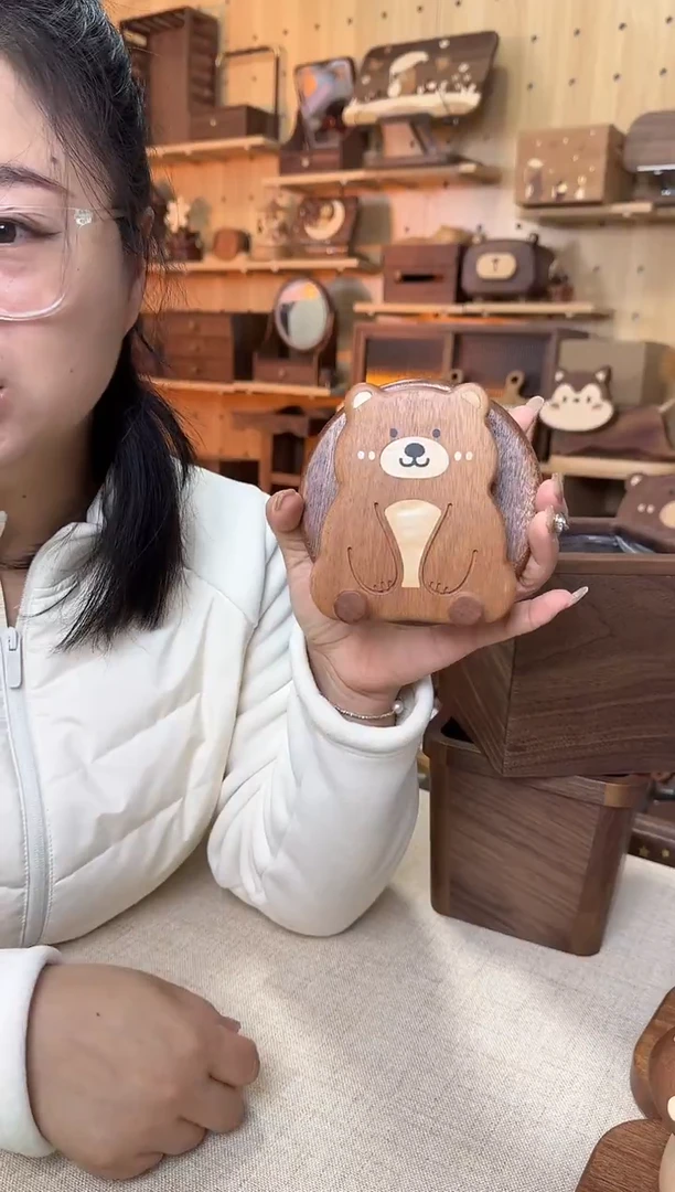 木乌檀木实木小熊手机支架