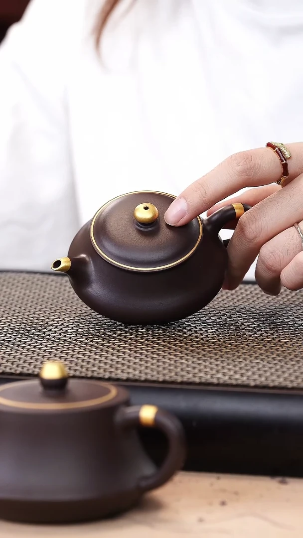 茶壶紫砂四号井茄皮紫泥描金明炉100cc