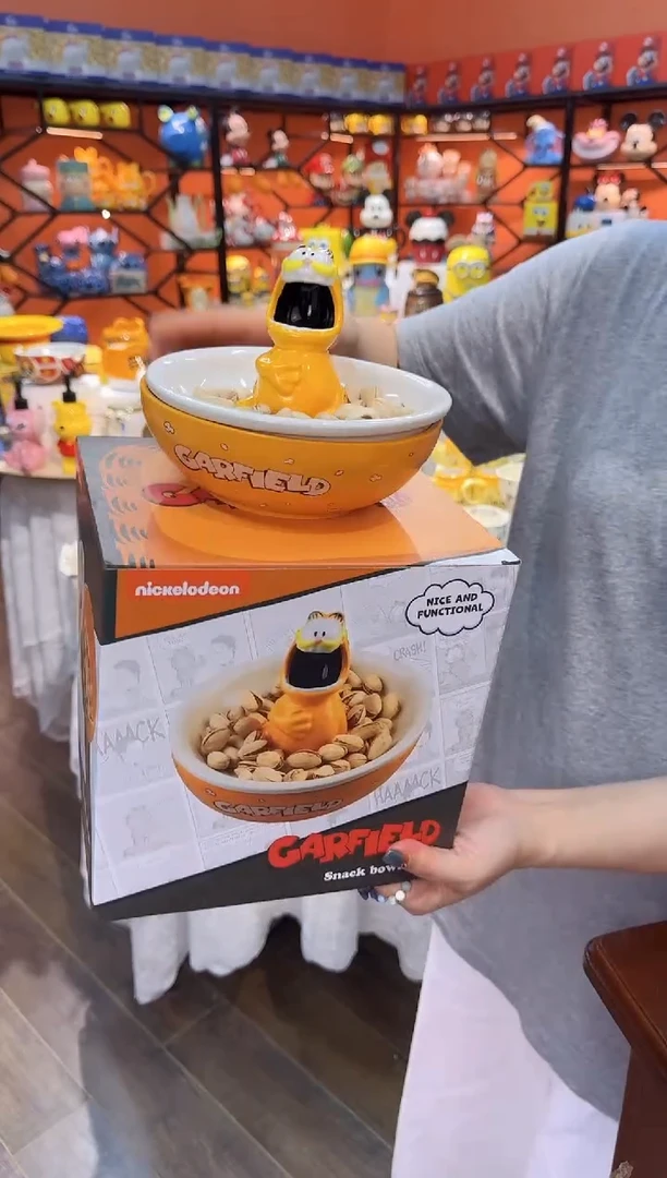 瓷片@@加菲猫陶瓷瓜子盘