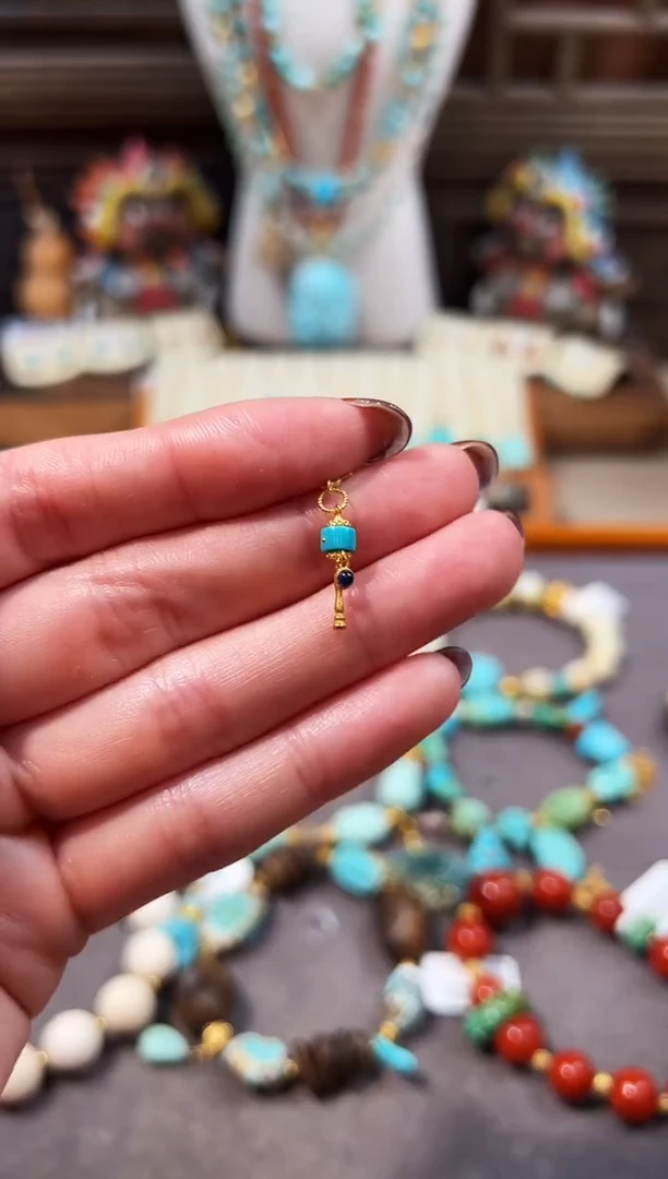 18K金镶嵌绿松石提溜转经筒