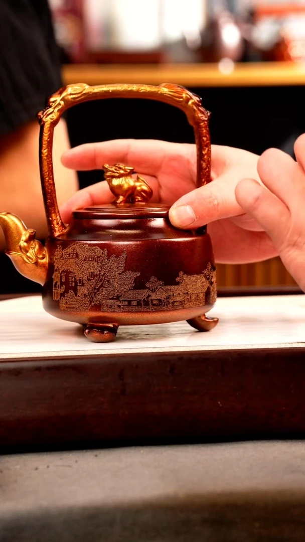 茶壶紫砂金贝烧 三足提梁 忆江南