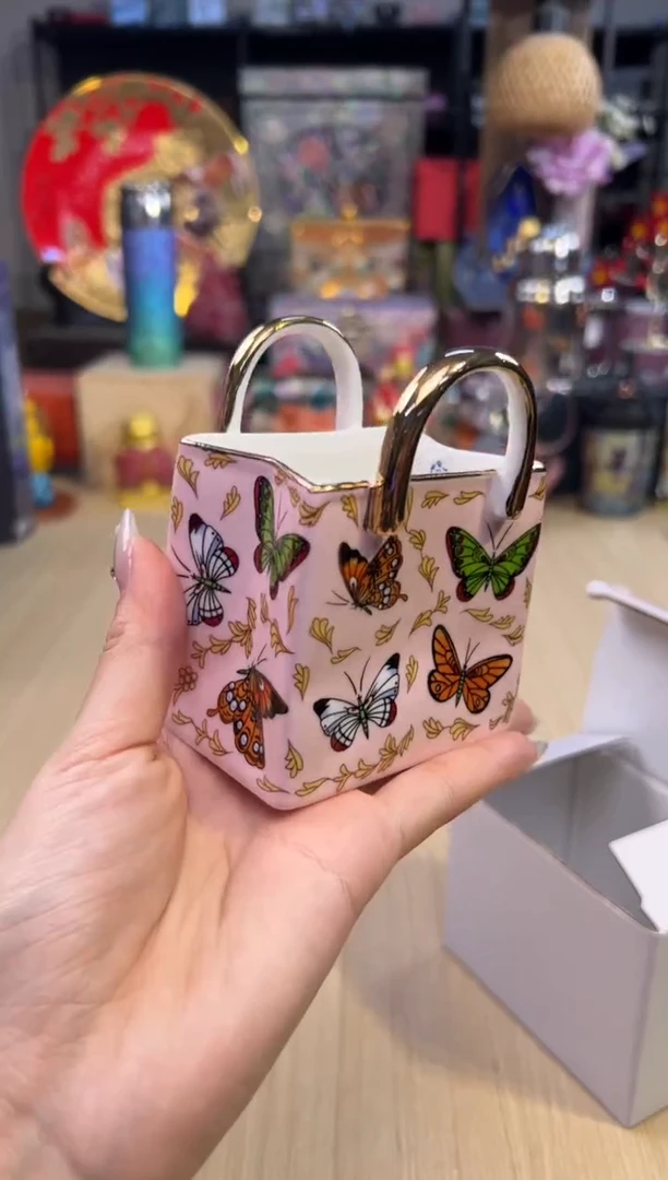 51粉色蝴蝶包包收纳罐