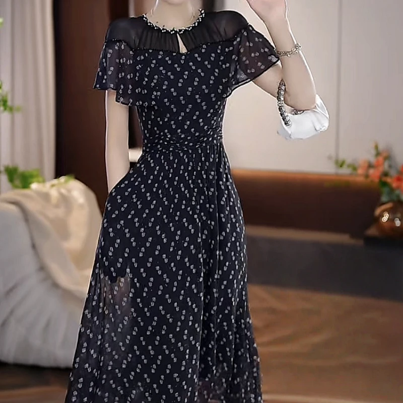 2025夏季新款时尚高端优雅气质时尚精致碎花收腰显瘦中长款连衣裙