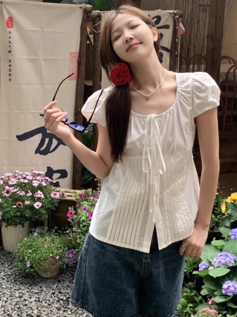 白色泡泡袖绑带衬衫女2025夏新款韩系设计感宽松显瘦短袖衬衣上衣