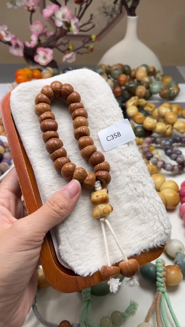 菩提根/象牙果手串WC358凤羽手持15mm一串随机