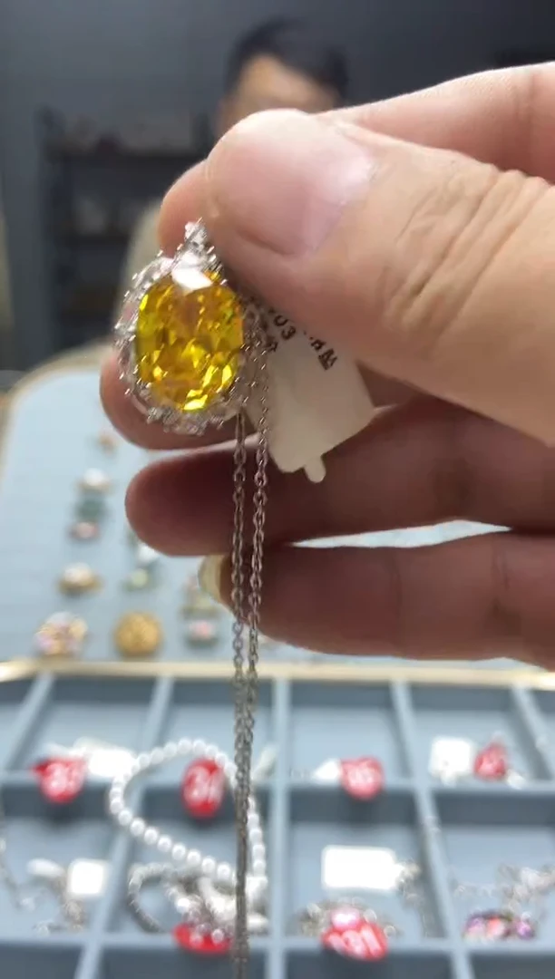 合金镶嵌黄水晶吊坠