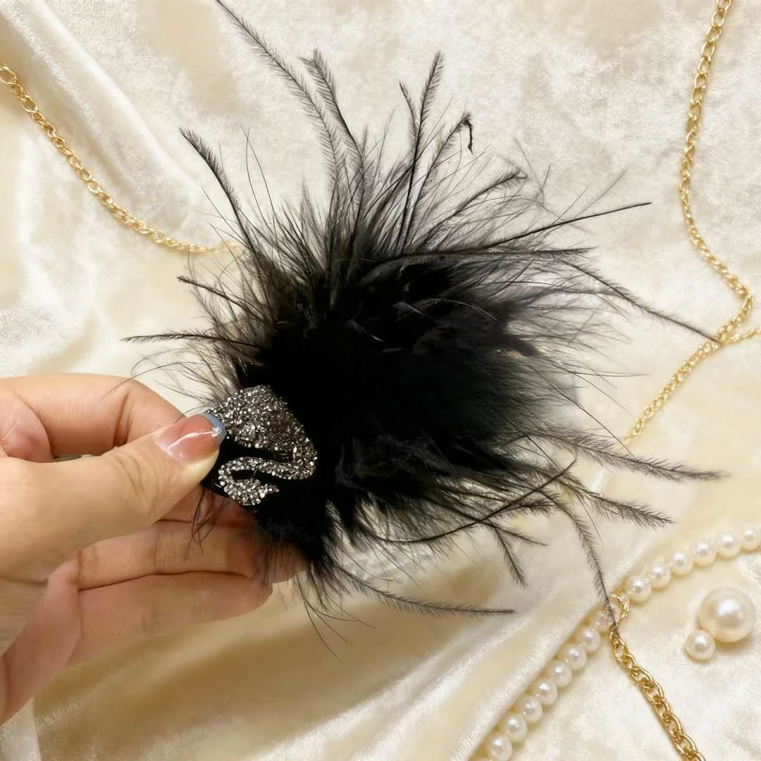 新款小天鹅羽毛抓夹丸子头丸子头