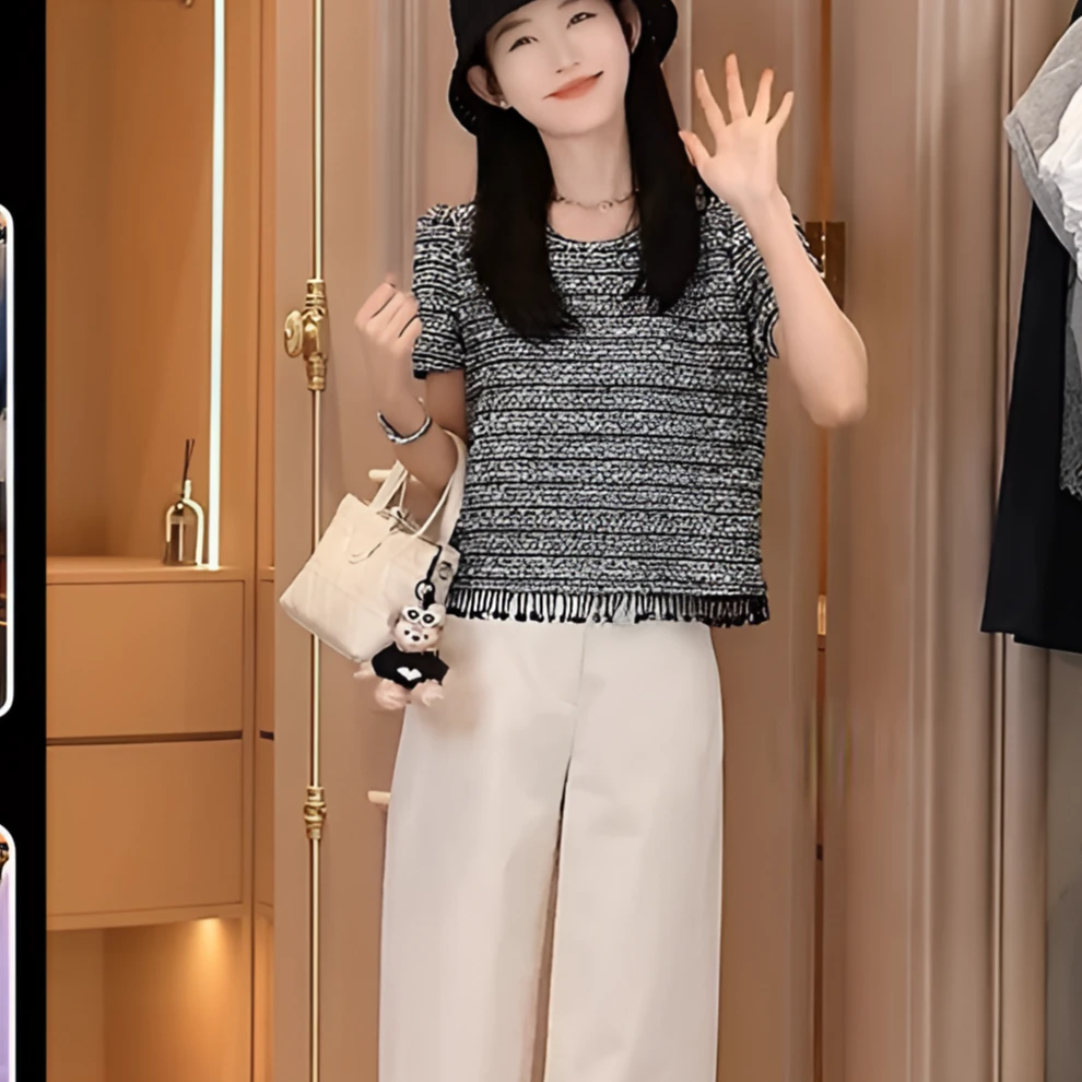 2025初夏穿搭女装设计感别致绝美条纹流苏短袖针织衫两件套裤子潮