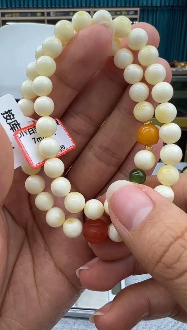 未镶嵌琥珀手链57秒拍号假一罚十