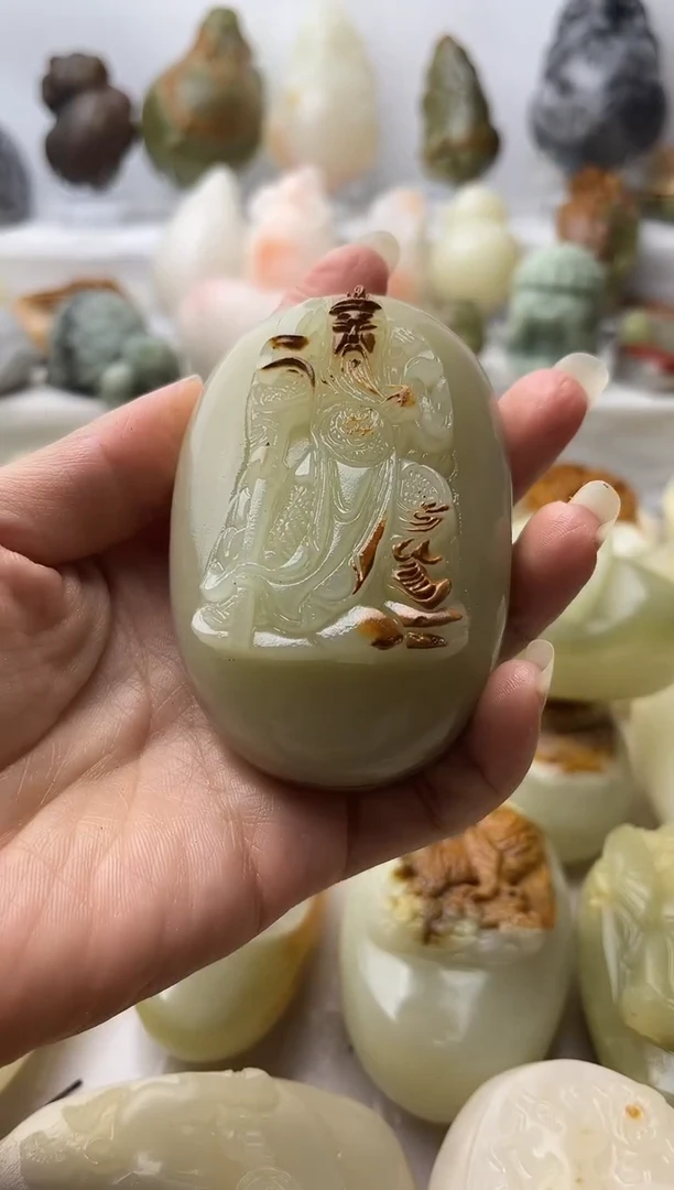 石材方解石手把件不退换关公