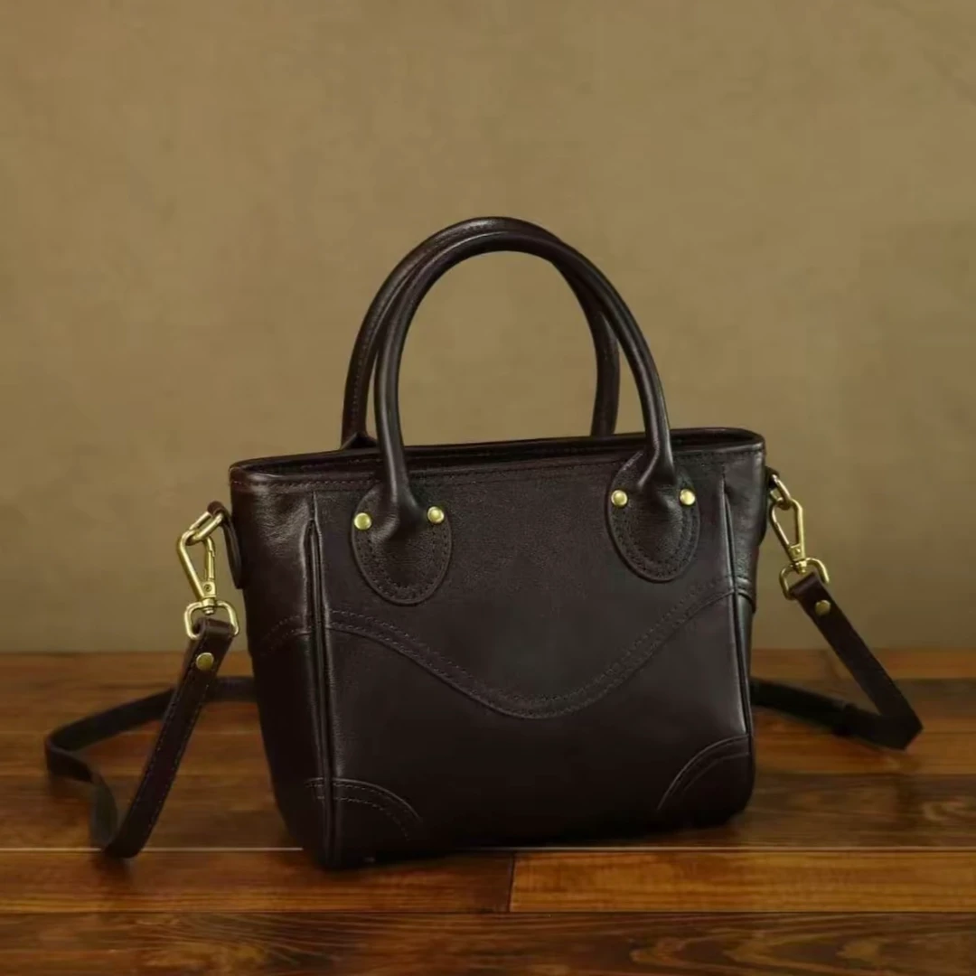 头层植鞣牛皮真皮女士包包简约复古单肩腋下斜挎笑脸菜篮包包