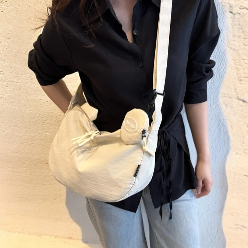 休闲日系原宿饺子包韩国软妹包包女2025新款潮简约纯色单肩斜挎包