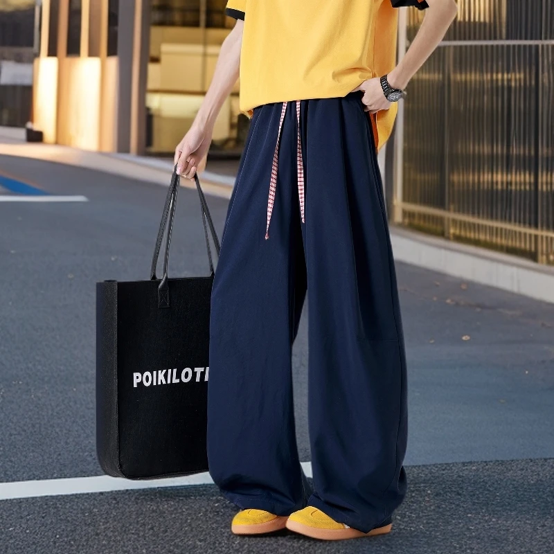 纯色冰丝凉感裤子男2025夏季新款情侣潮牌直筒卫裤宽松弯刀休闲裤