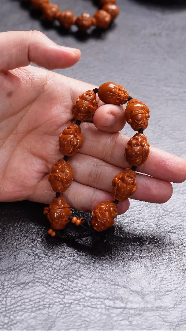 橄榄核吊坠我***来橄榄核