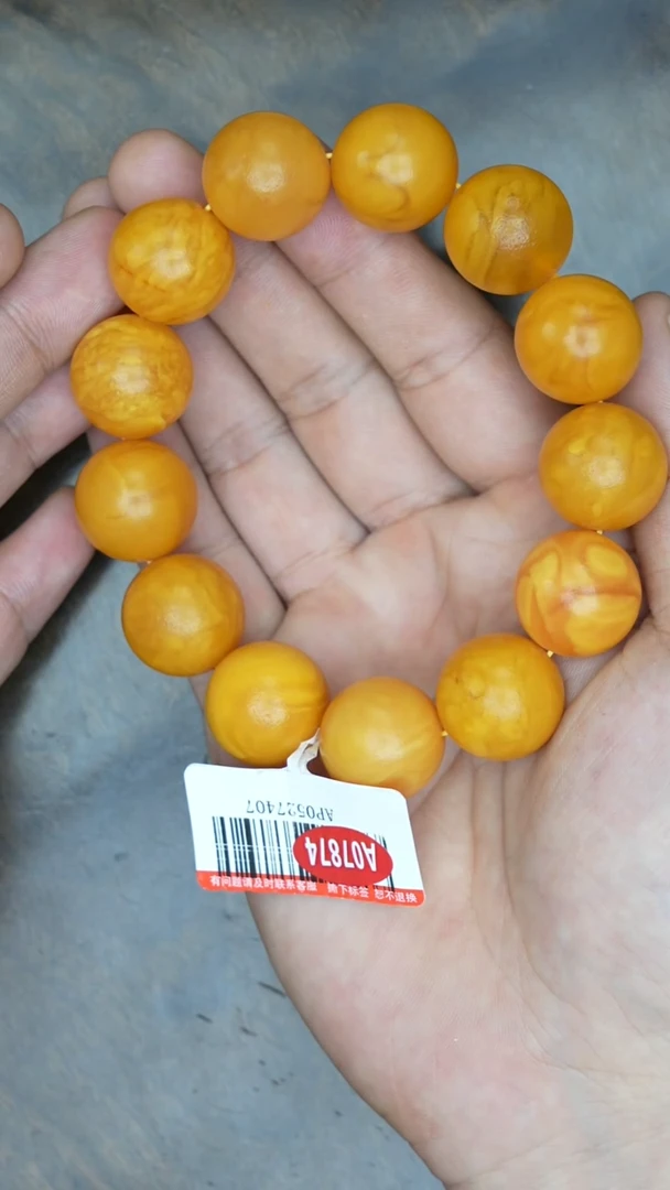 【闪购商品】琥珀裸石未镶嵌老花蜡橘皮手串