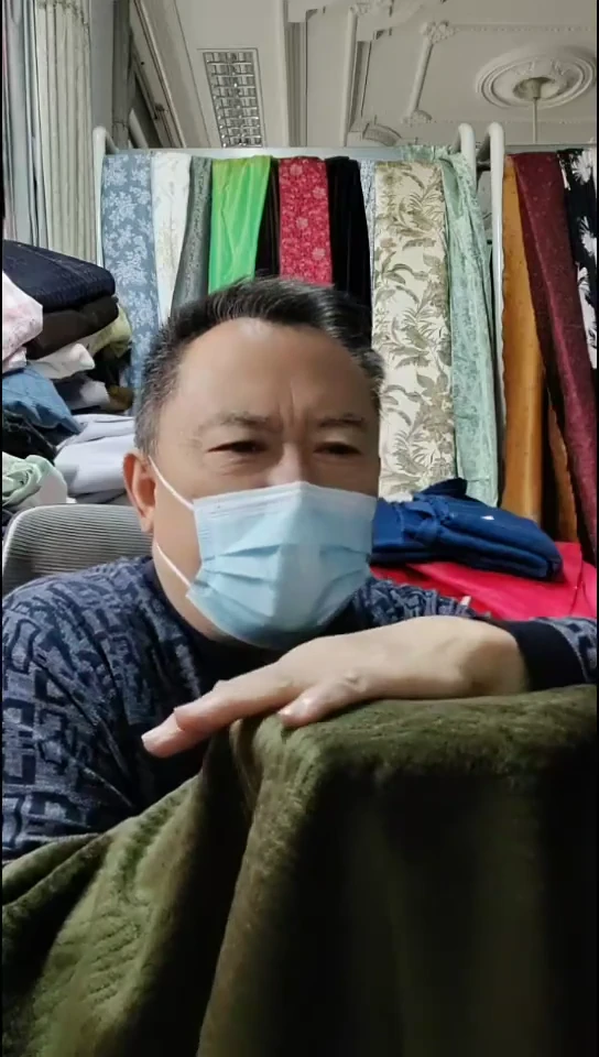 墨茶绿雪花绒绒布料