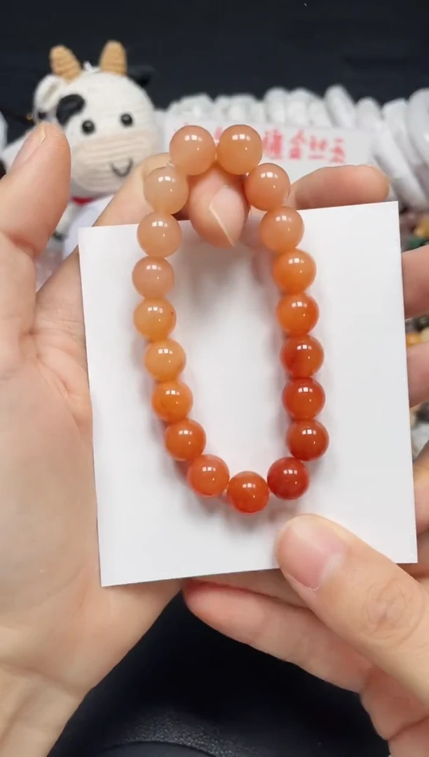 【闪购商品】石英质玉手链未镶嵌柿子红卡10