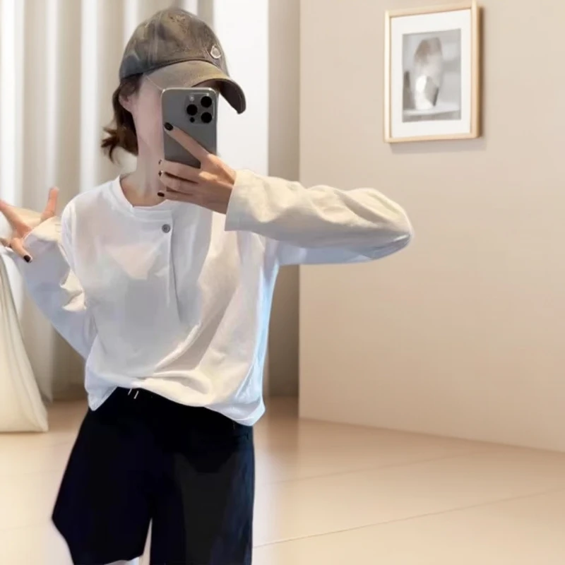 2025秋季新款韩版纯棉一粒扣白色长袖T恤女极简风宽松时尚ins上衣