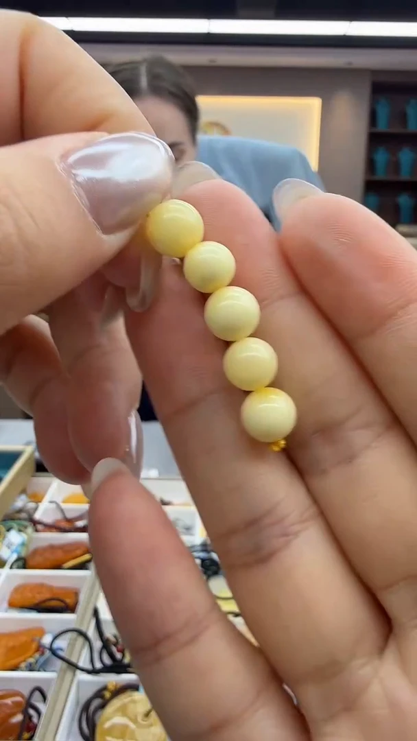 琥珀颈饰未镶嵌10秒拍号 假一罚三