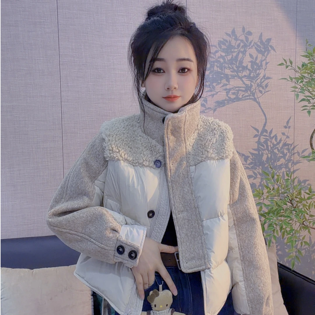 丹丹精选--16165新款立领肩膀拼接毛毛短款羽绒外套