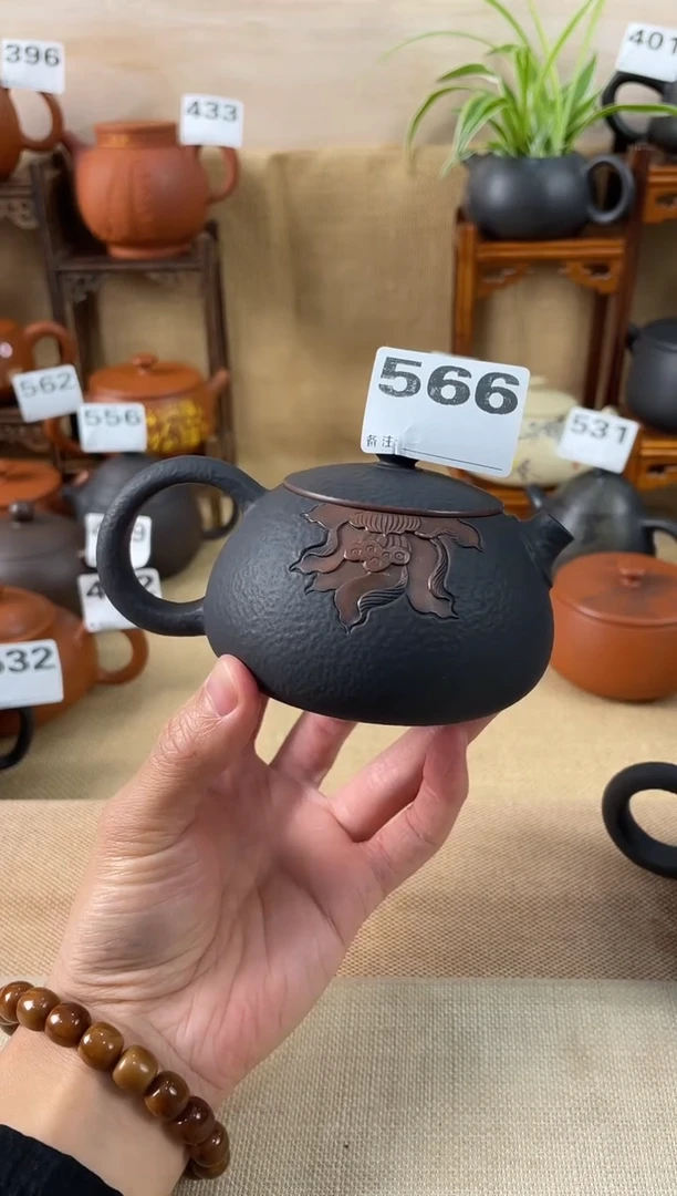 樱***子建水紫陶单壶放漏/A566