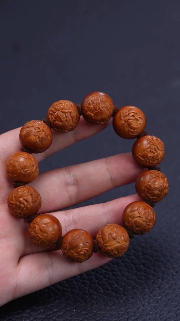 【闪购商品】橄榄核其他朱红娟1.8正圆光珠浮雕荷塘月色手串
