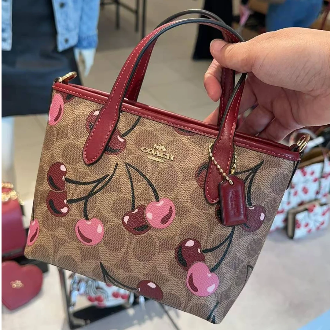 【裸包】COACH蔻驰 city 樱桃拼红  迷你拉链饺子包（20*15*8)CY737