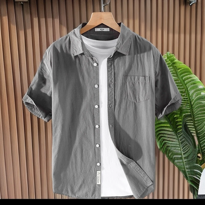 纯棉男士短袖衬衫青年白色翻领休闲寸衣宽松百搭纽扣上衣开衫衬衣