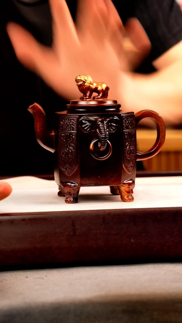 茶壶紫砂金贝烧 太平有象 刻绘