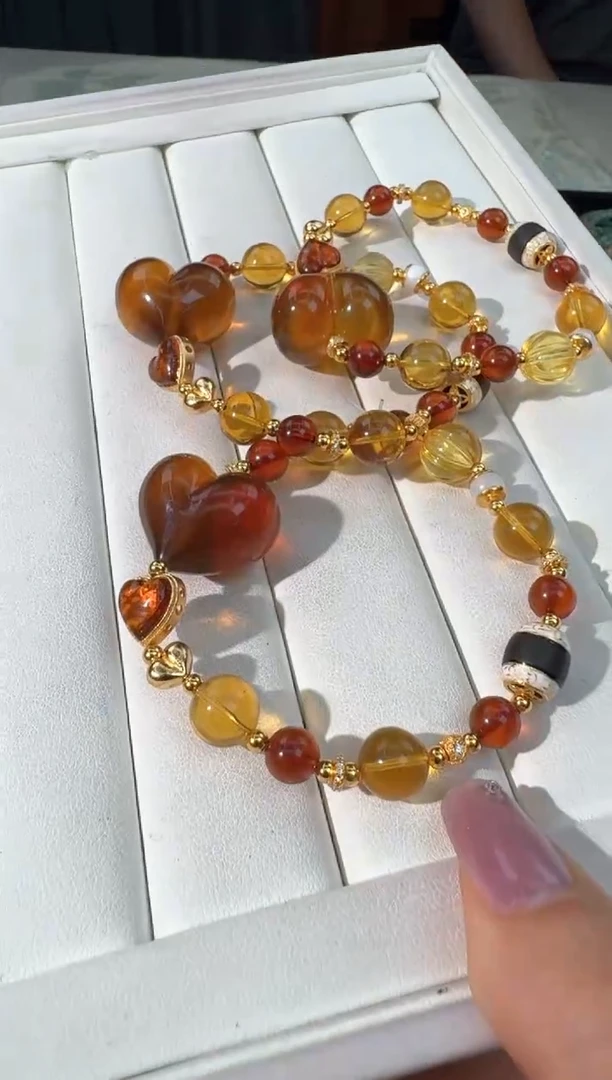 银S925镶嵌琥珀手链棕珀屁桃设计款发货多样性发其一