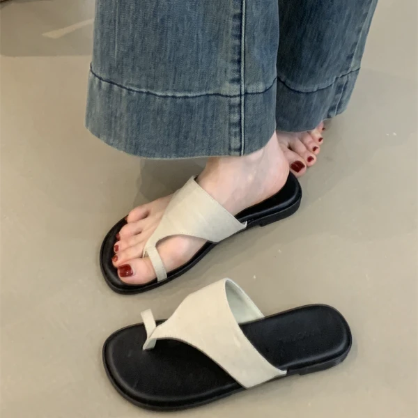 NQL-819-1平跟露趾低跟一字式扣带时装套趾拖鞋镂空软底沙滩拖鞋