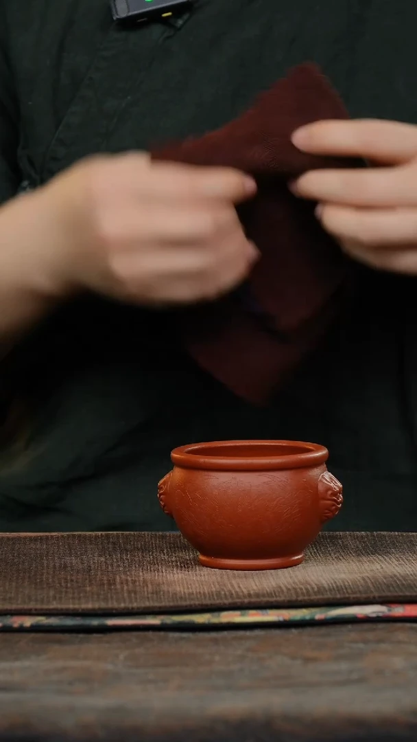 刻绘瑞兽紫砂杯34324