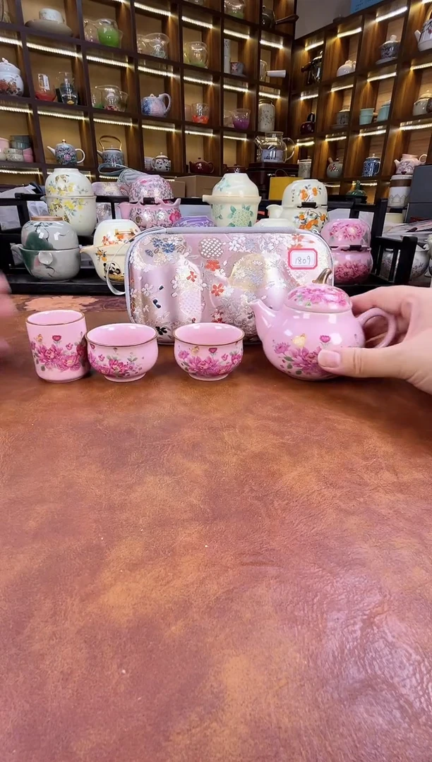 瓷片粉色梨形手把壶旅行
