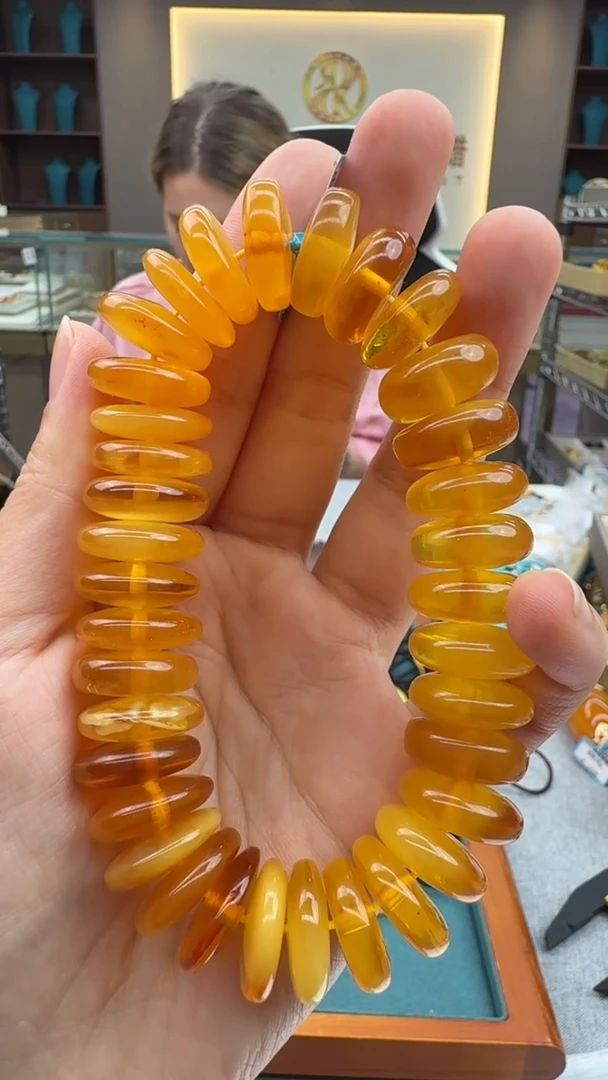 手链琥珀未镶嵌34秒拍号 假一罚三