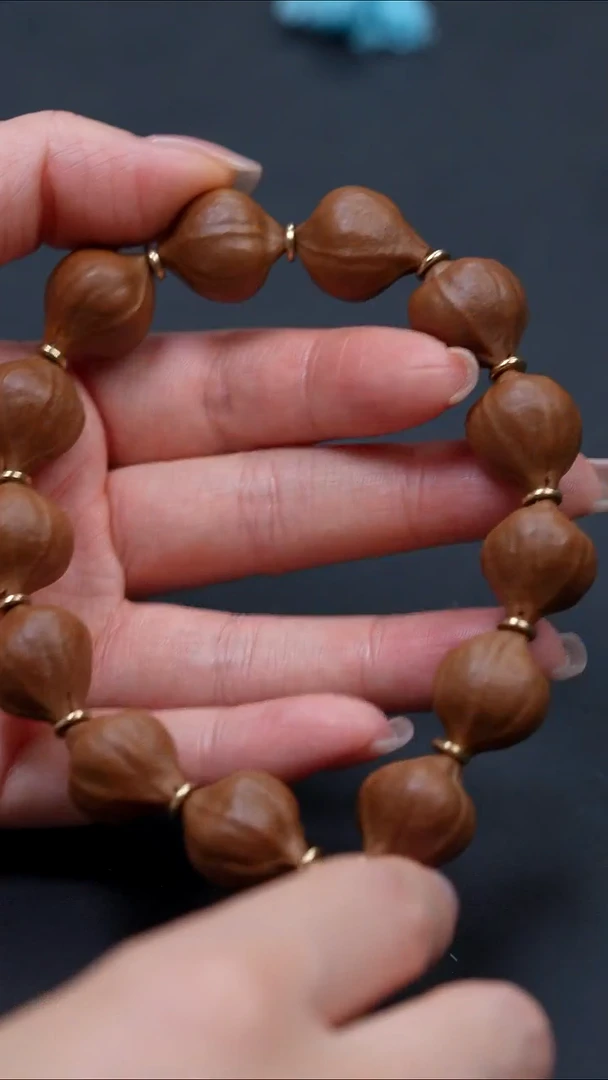 橄榄核手串小籽素串蜜桃臀