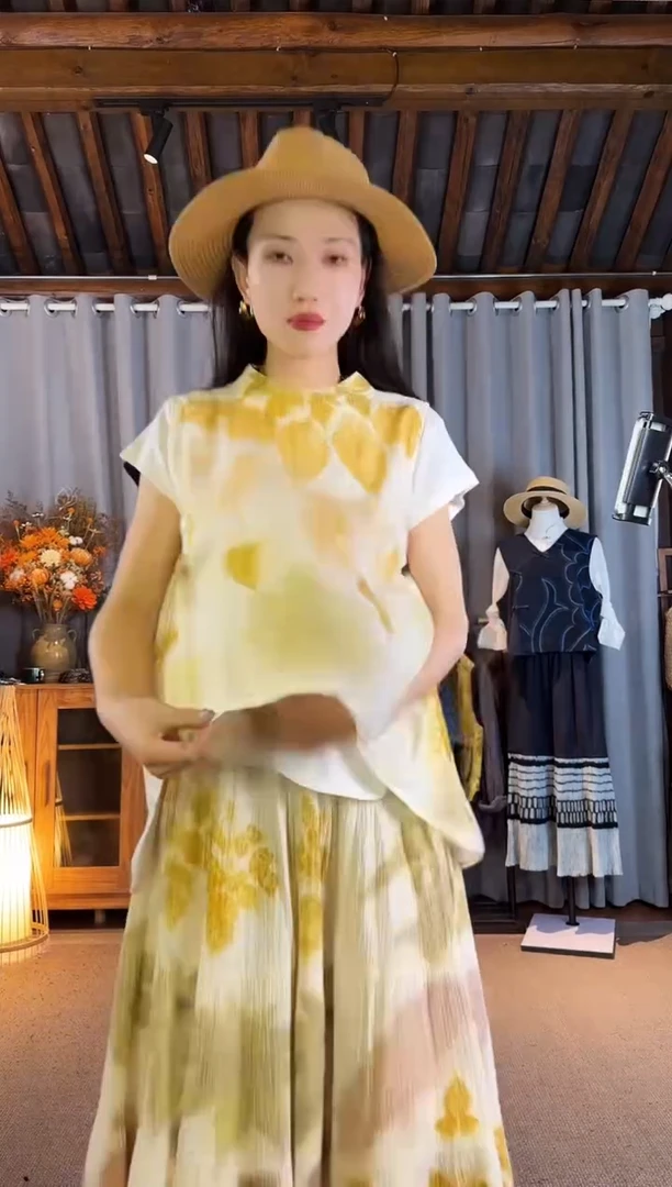 设计师款黄色拓印前短后长叶子背心