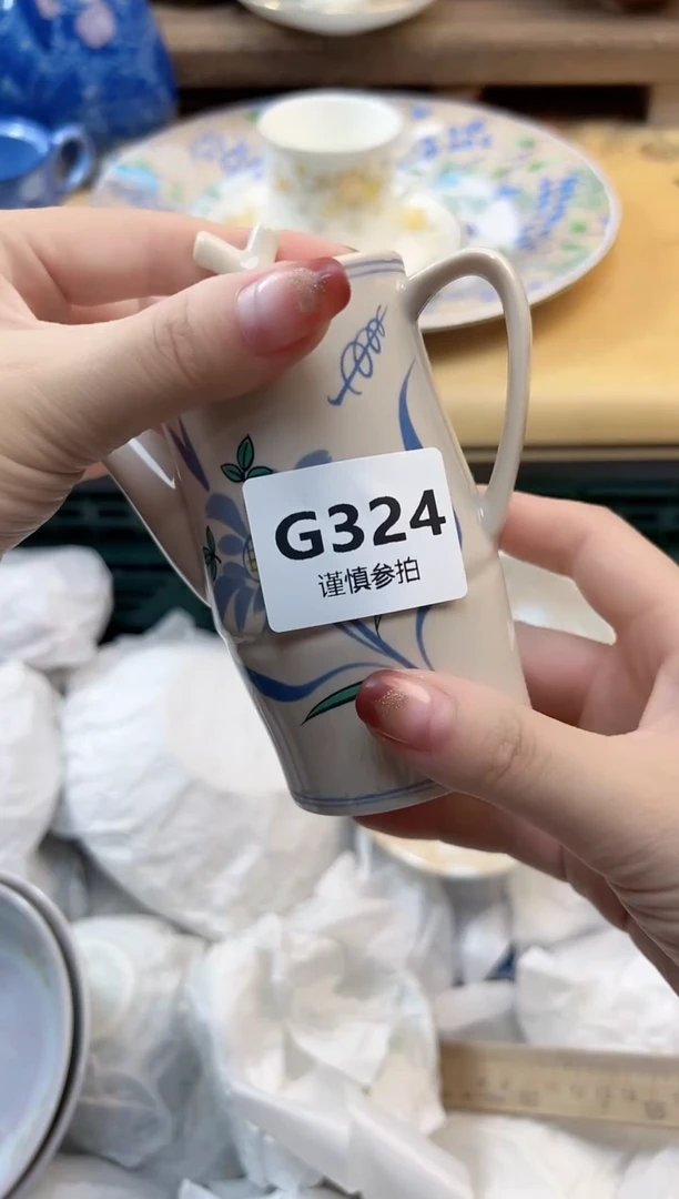 瓷片?**F 324