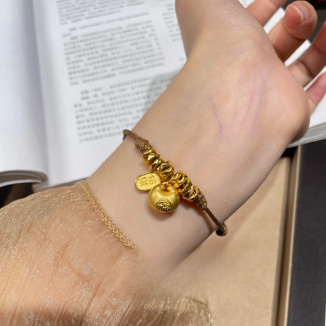 铜合金手链 金色小胖福盘缠手串女新中式编织摩卡棕绳纳福牌手链