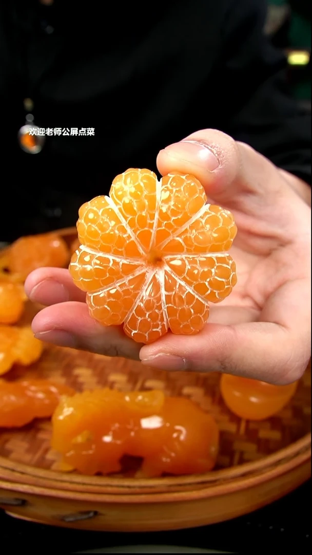 印尼石小桔子手把件