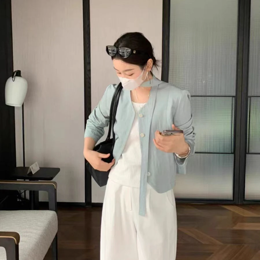 S2403【爱丽丝甜梦】 早春名媛风飘带单排扣短款外套