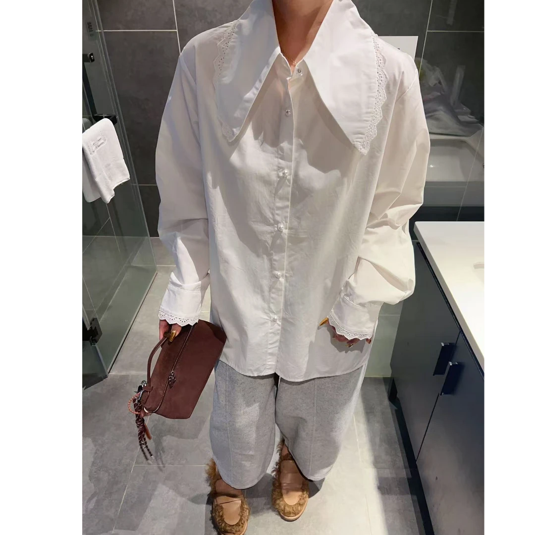 秋冬新款简约百搭衬衫女宽松单排扣大翻领时尚小众别致中长款衬衣