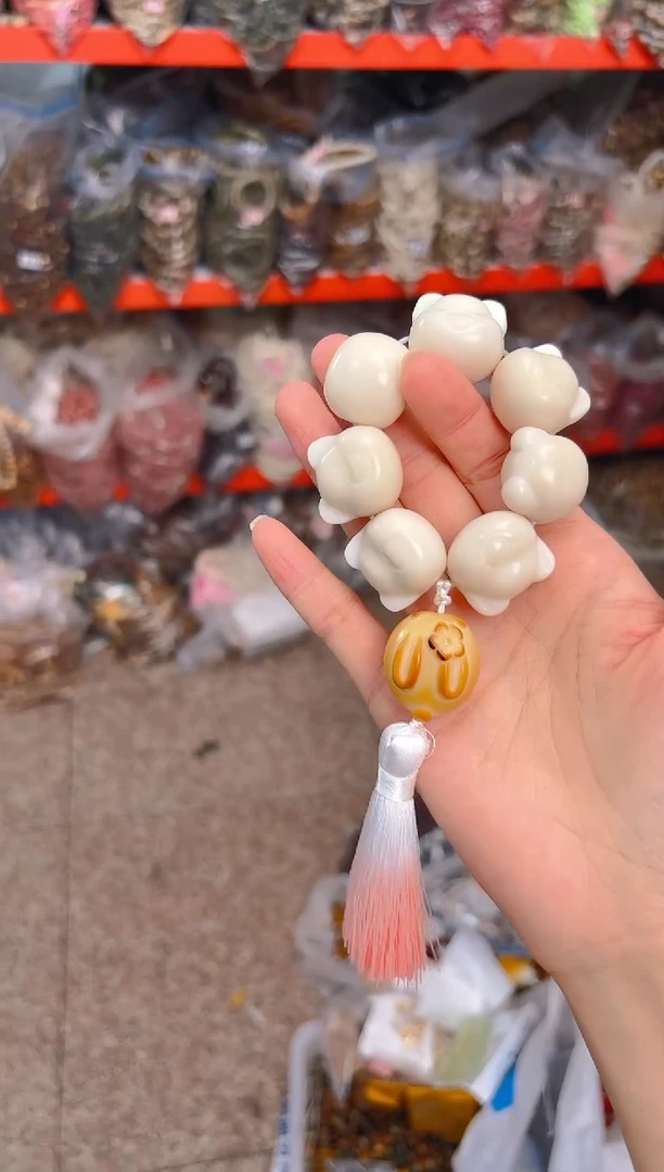 吊坠菩提根/象牙果白色熊手捻带流苏