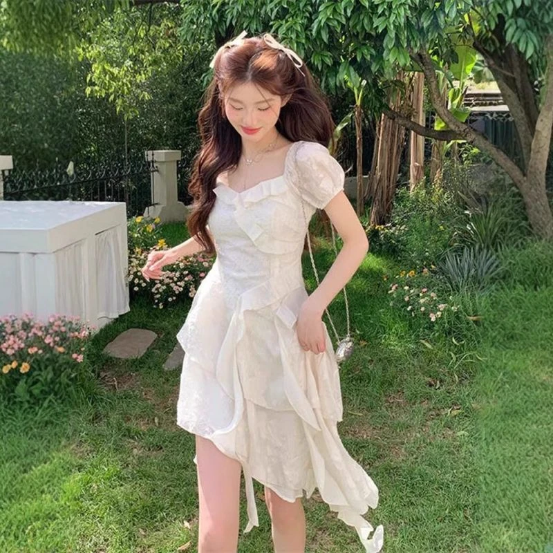 夏季甜美超仙荷叶初恋新款连衣裙2025不规则收腰白裙法式欧若风