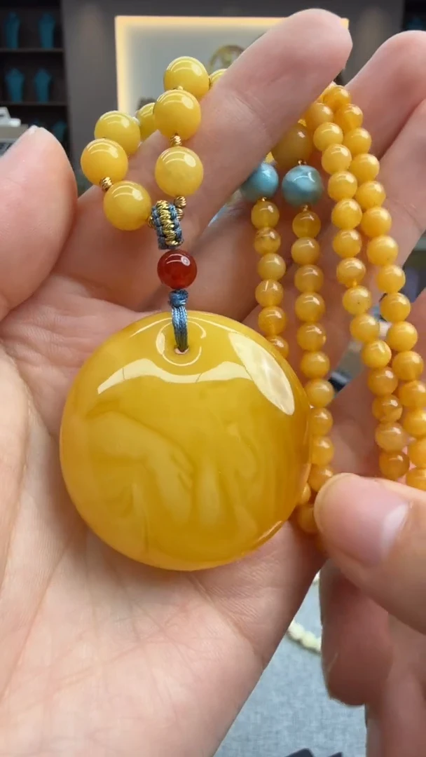 琥珀颈饰未镶嵌130秒拍号 假一罚三