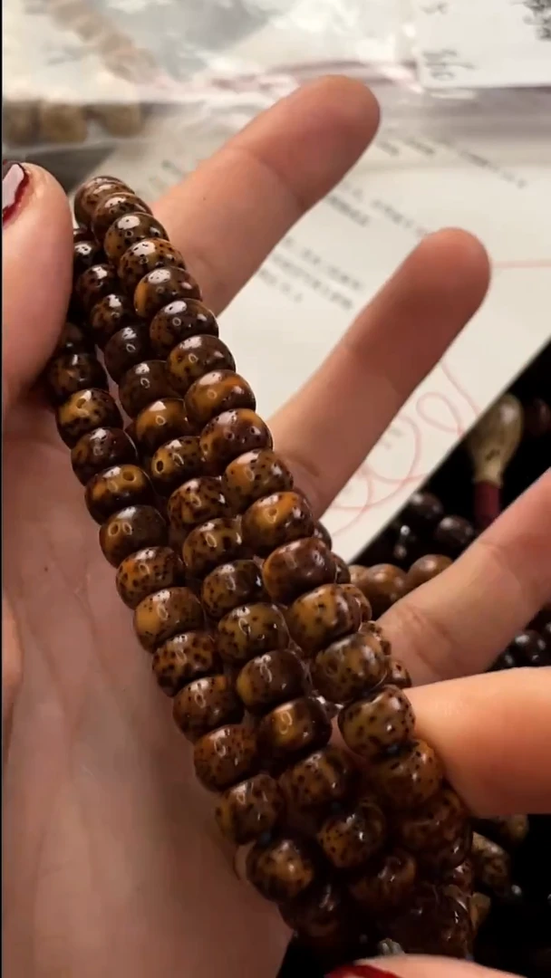 吊坠星月菩提精工级中珀花皮新桶8*6长串
