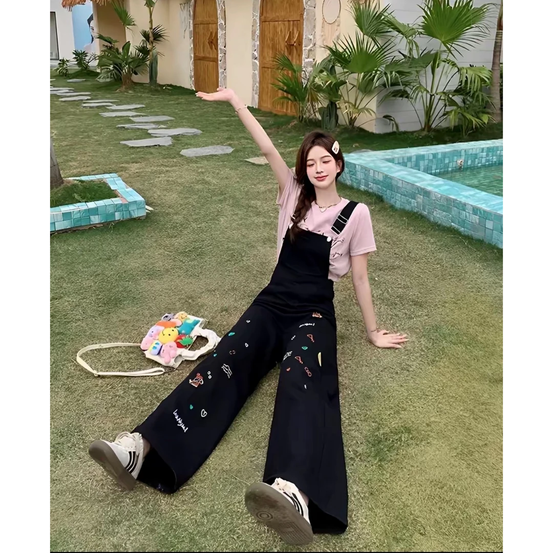 新款卡通刺绣黑色减龄牛仔背带裤2025早秋女高腰宽松直筒拖地长裤