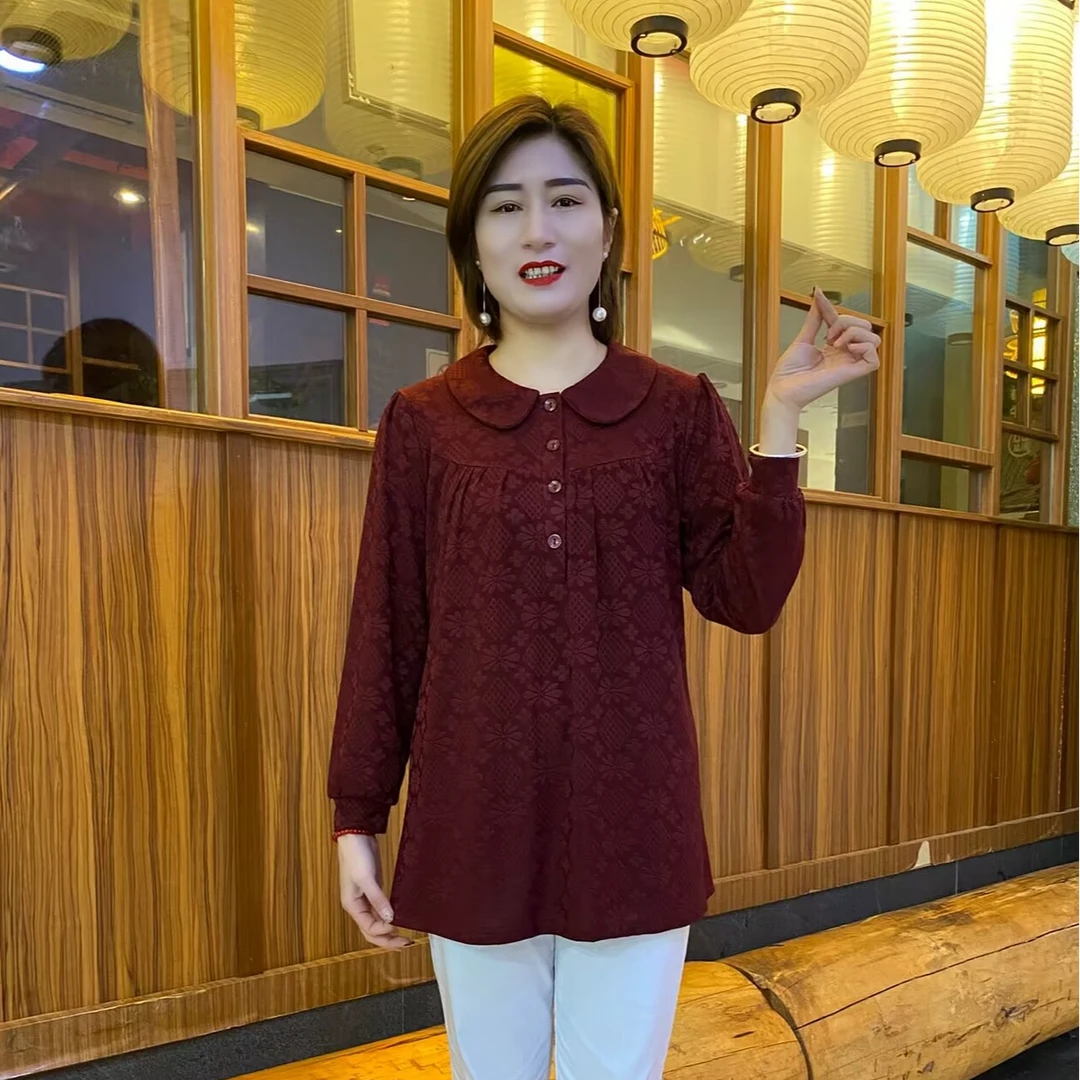 2025春季长袖新款时尚娃娃领纯色提花气质显瘦大码中长洋气衫