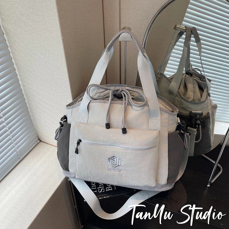 探屿大容量手提旅行包时尚短途旅游收纳行李包干湿分离运动健身包