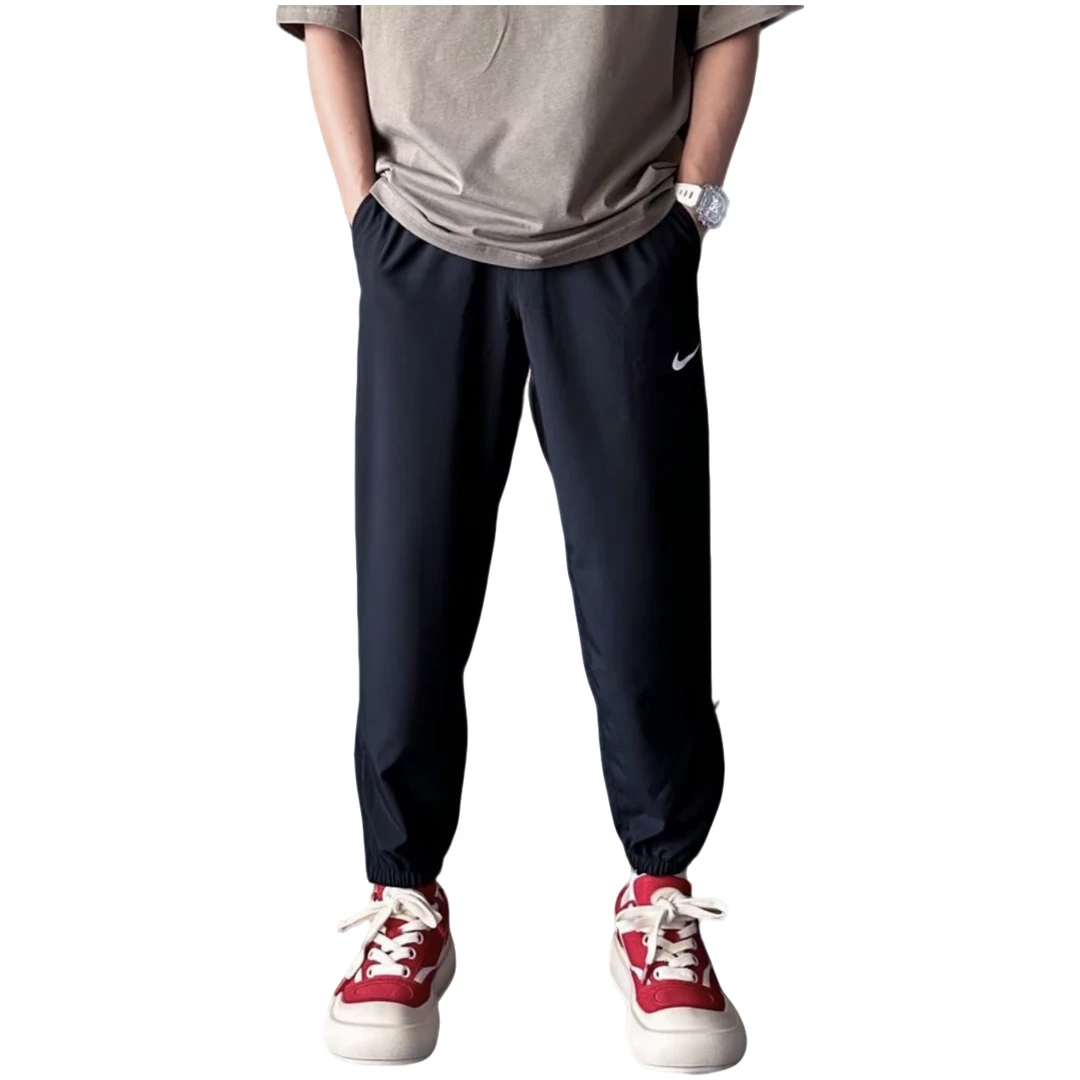 NIKE/耐克官方正品印花束脚透气休闲裤黑色FB7498010